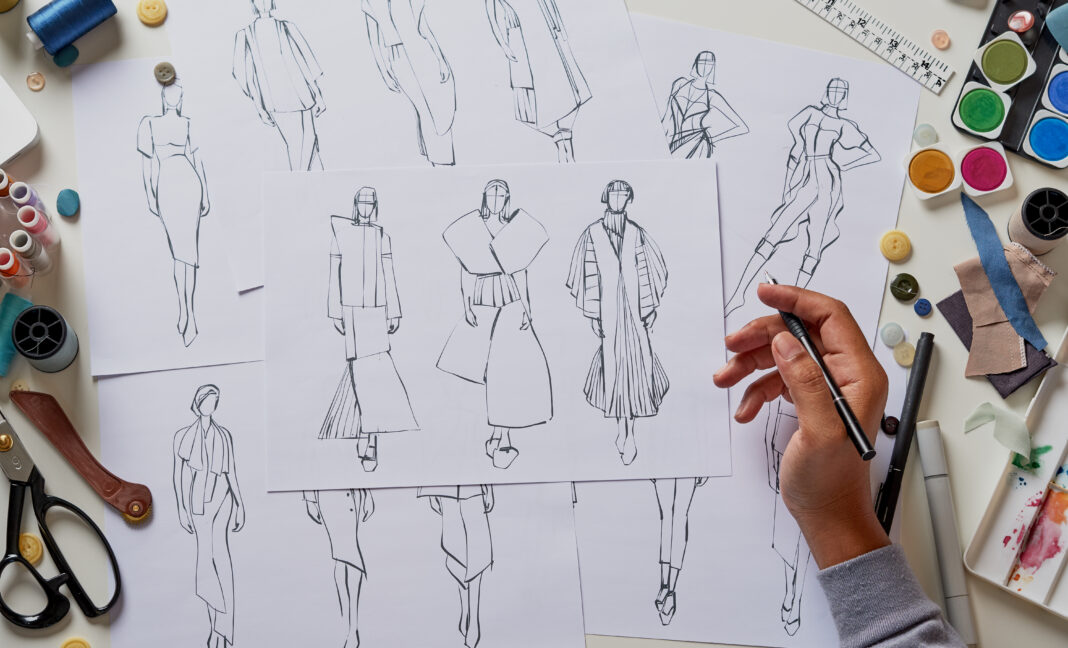 Fashion designer stylish drawings sketches textile fabric materi