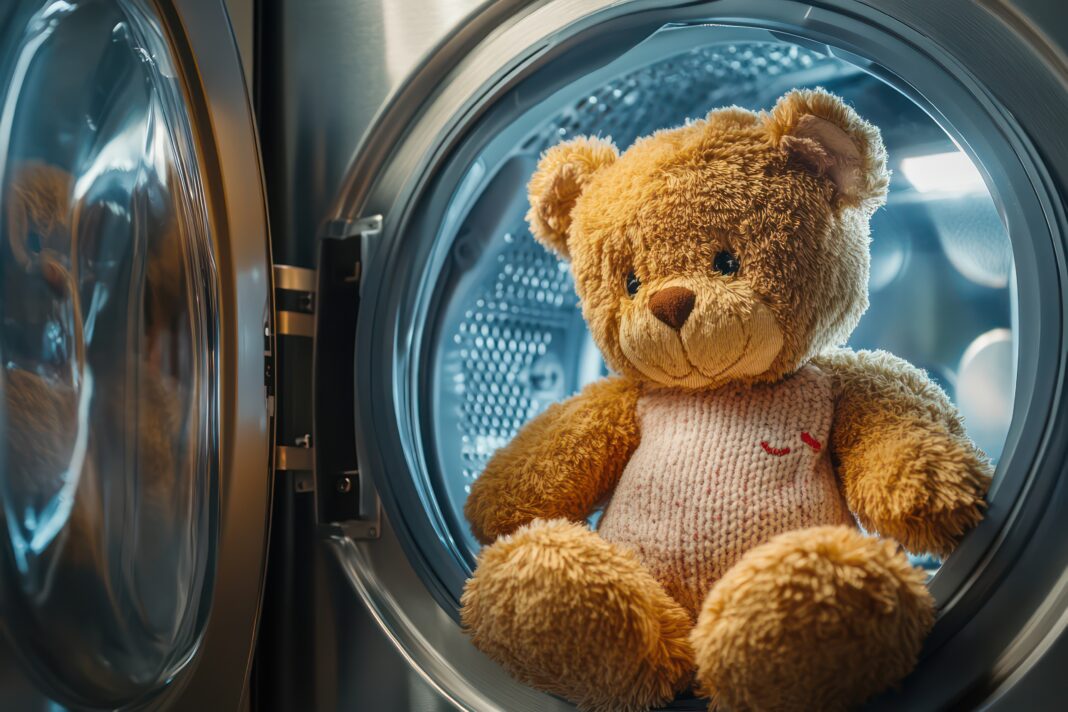 Teddy bear in washing machine for cute family content